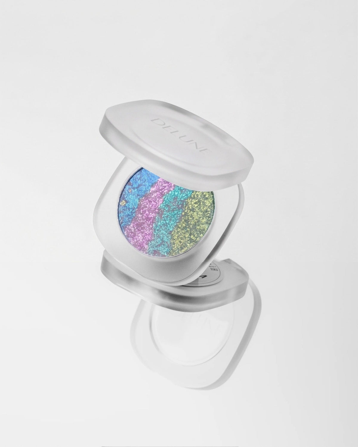 Iluminador en polvo compacto