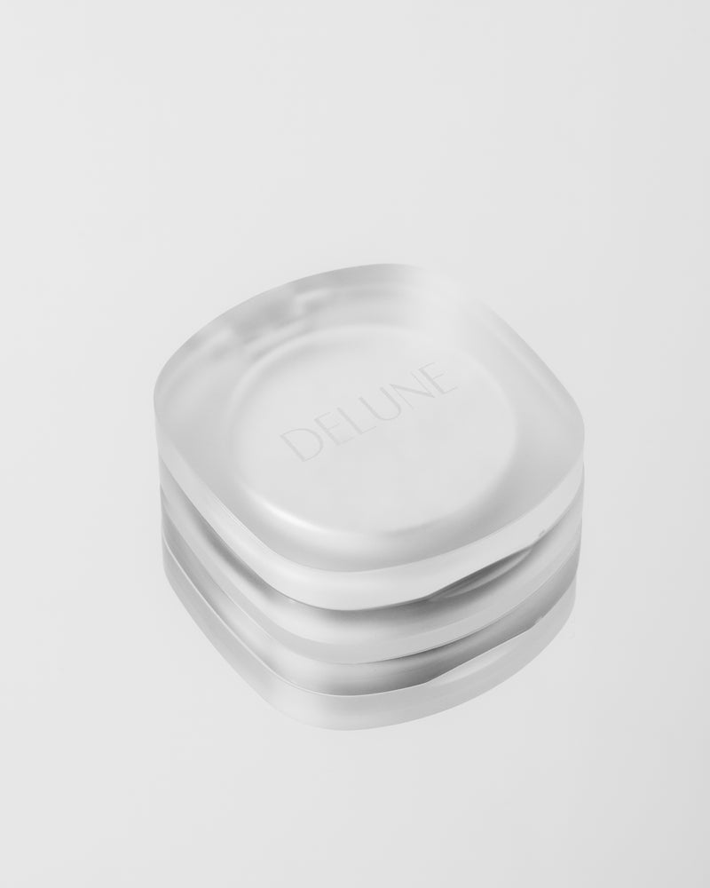 Iluminador en polvo compacto