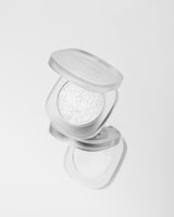 Iluminador en polvo compacto