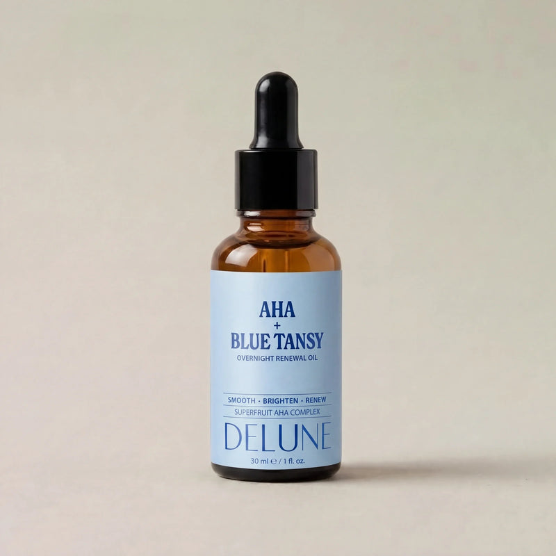 Aceite renovador de noche AHA + tanaceto azul de Delune, foto de estudio