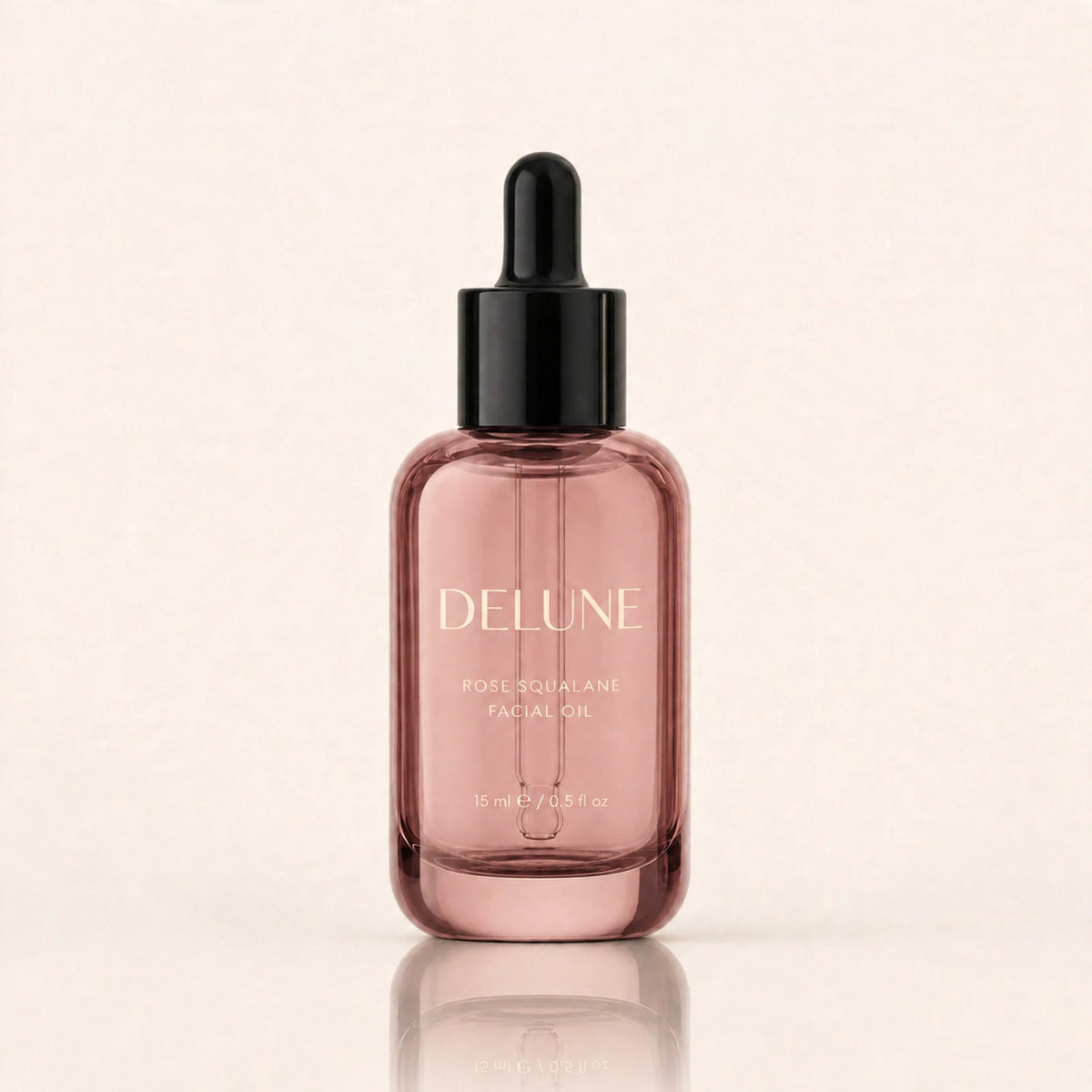 Aceite facial de escualano con rosa de Delune, 15 ml, en frasco de vidrio rosa palo